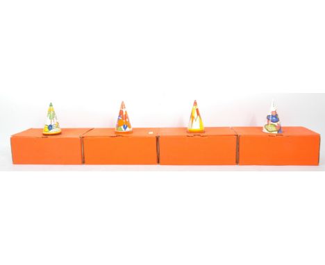 A group of four contemporary Clarice Cliff sugar casters. The casters being from the Bizarre collection. The range to include
