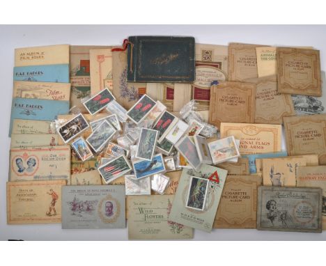 A large collection of 20th century cigarette cards to include Kings &amp; Queens of England, Tennis, Wild Flowers, Film Stars