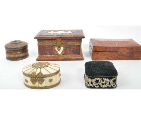 A collection of 20th century boxes to include a Birdseye walnut box with inlaid mother of pearl to lid, a wooden casket with 