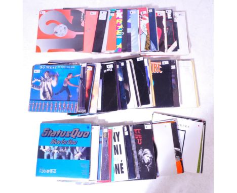 A large collection of vintage 20th Century long play LP vinyl records. To include; Status Quo, Tina Turner, Slade, Elton John