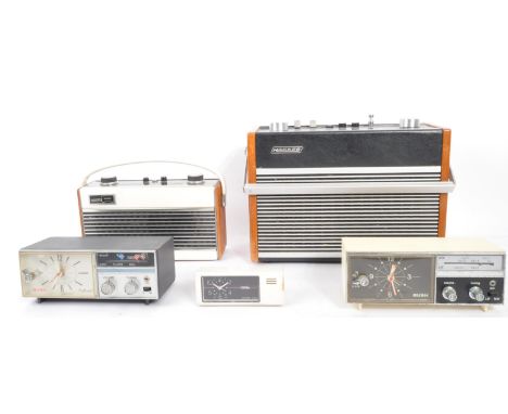 A collection of vintage 20th Century retro portable radios and electronic alarm clocks. Including; Hacker hunter fm - am RP38