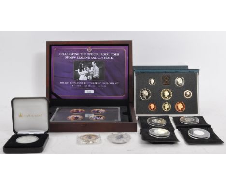 An assortment of vintage 20th century &amp; later UK uncirculated proof silver commemorative coins &amp; commemorative sets. 