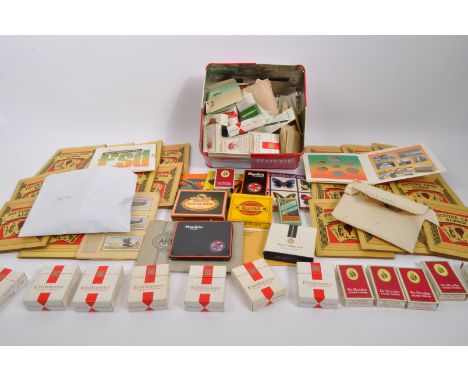 Collection of cigarette cards mainly loose in sets stored within cigarette packets, some presented&nbsp; within albums.