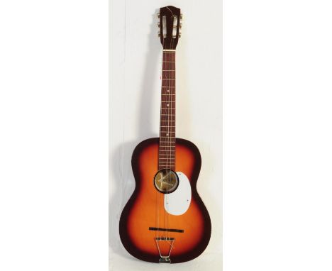 Kansas - A vintage 20th century Kansas guitar musical instrument having white pickguard and mother of pearl inlay to position