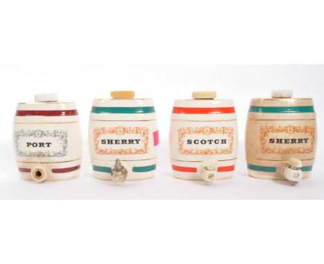 A collection of 20th century&nbsp;Royal Victoria Wade pottery barrel decanters to include 2x Sherry, Scotch &amp; Port. Each 