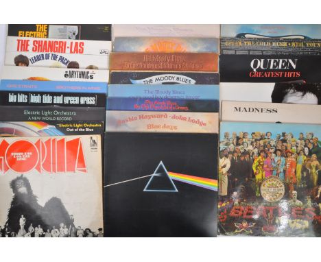 A collection of vintage 20th century LP long play vinyl records to include Pink Floyd 'The Dark Side of the Moon', Dire Strai