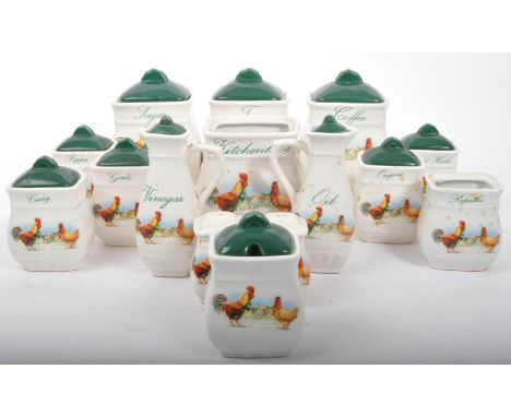 A vintage 20th Century ceramic pottery kitchen condiment storage matching set. Comprising of; coffee, tea, salt, pepper, suga