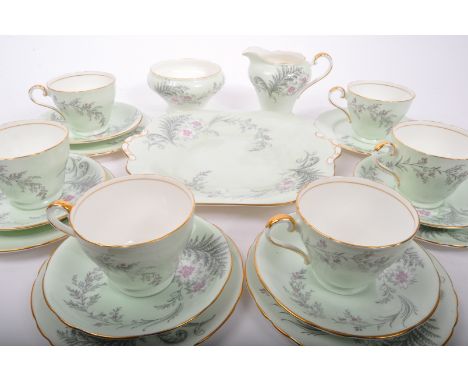 A vintage mid 20th Century Aynsley fine bone china tea service set. Comprising of; tea cups, saucers, serving plates, milk ju