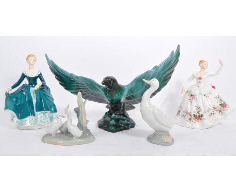 An assortment of vintage 20th century English &amp; Spanish fine bone china figurines. The lot to include a Royal Doulton 'Sh