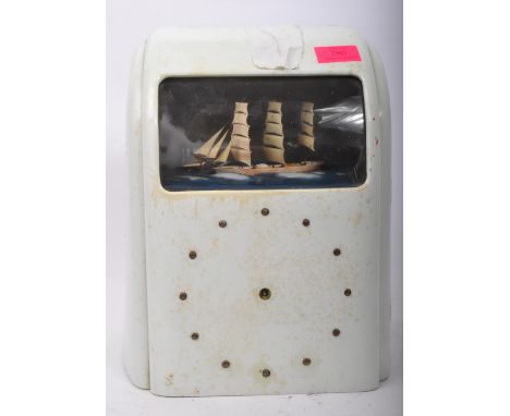 Vitascope - A vintage 20th century circa. 1940's Art Deco era Bakelite clock in white colourway. The clock having&nbsp;a sail