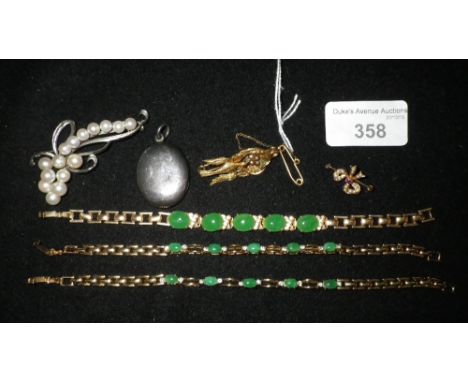 A silver and synthetic pearl brooch, three 'jade' bracelets and other costume jewellery