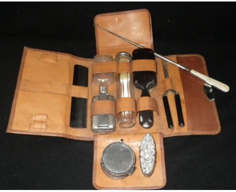 A silver and tortoiseshell trinket box, a travelling toiletry set and other items