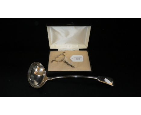 A silver plated ladle and a silver corkscrew (2)