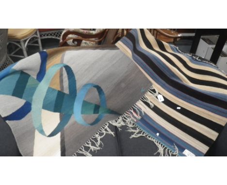 A 'First phase Chief’s blanket' by Nancy Kozikowski and a modernist wall hanging with woven signature " V "