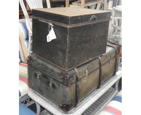 A large early 20th century cabin trunk with a floral fabric lined interior and a metal trunk