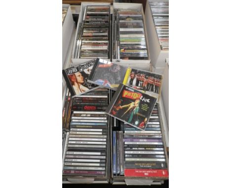 Four boxes of CD's by various artists to include Bob Dylan, Sex Pistols, The Jam and other artists