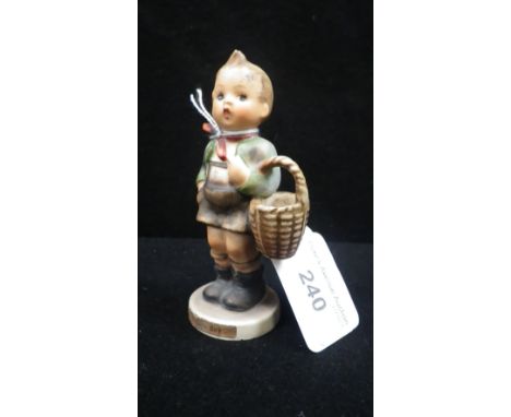 A small Hummel figure 'Village Boy' 