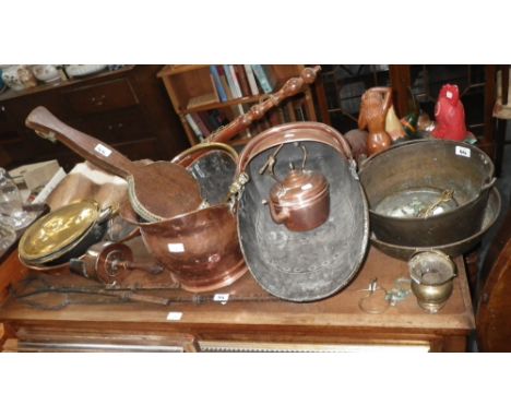 A 19th century copper helmet coal scuttle, a jam pan and similar metalware