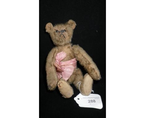 A small vintage Steiff Teddy bear, button in left ear, 8" high