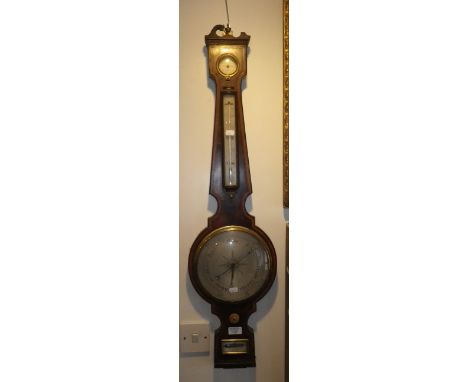 A George III mahogany wheel barometer inscribed "Tyler New St Square London"