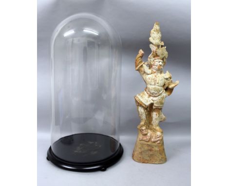 A GOOD LARGE CHINESE TANG DYNASTY LOKAPALA POTTERY TOMB GUARDIAN, together with a circular wood stand & a glass dome, the Gua