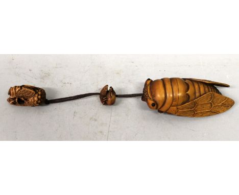 A FINE QUALITY SIGNED JAPANESE ONE CASE INRO IN THE FORM OF A CICADA, naturalistically carved, the underside of the inro with