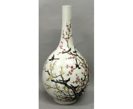 A GOOD QUALITY CHINESE FAMILLE ROSE PORCELAIN BOTTLE VASE, the sides painted with birds in flight and perched on blossom bear