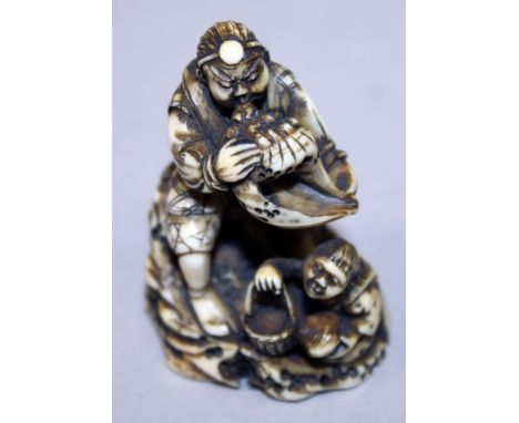 A GOOD QUALITY JAPANESE MEIJI PERIOD IVORY NETSUKE OF BENKEI BLOWING A CONCH SHELL, the deity seated on rockwork and in the c