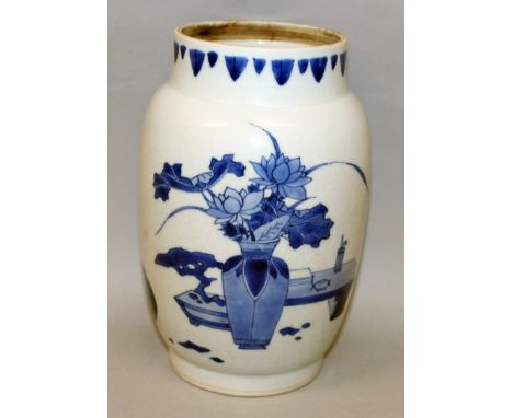 A GOOD 17TH CENTURY SIGNED CHINESE TRANSITIONAL PERIOD BLUE & WHITE PORCELAIN JAR, the sides painted with vases and precious 