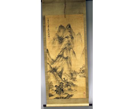 A CHINESE HANGING SCROLL PAINTING ON PAPER, in the manner of Riwu, within a patterned silk surround, depicting an extensive m
