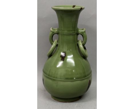 A CHINESE CELADON PORCELAIN VASE, with moulded ring handles and russet glaze splashes, 10.4in high.