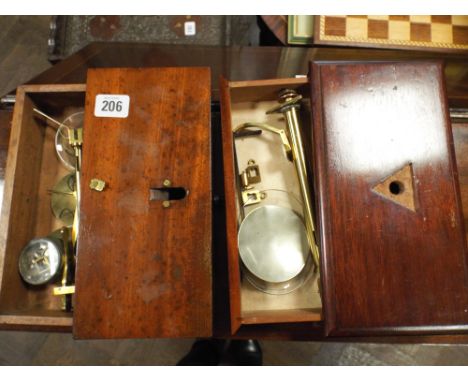 2 small brass balance scales in mahogany boxes