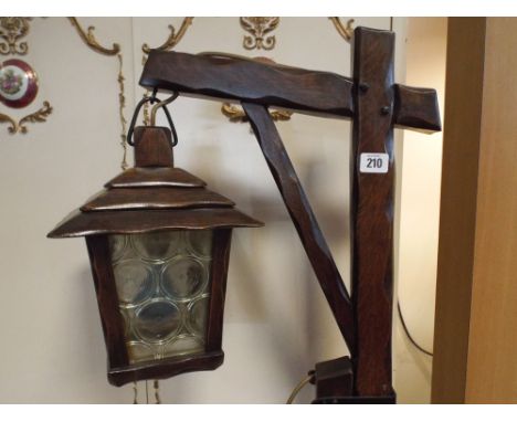 A gallow style oak adjustable standard lamp 