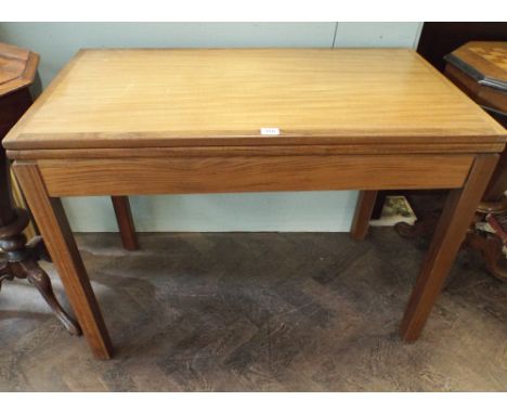 A 3' modern teak folding top card table 