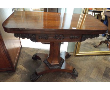 Early Victorian mahogany folding tea table standing on pillar and quadruple base 