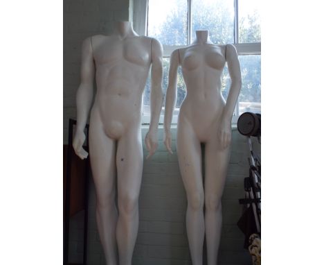 1 male and 1 female mannequin as found