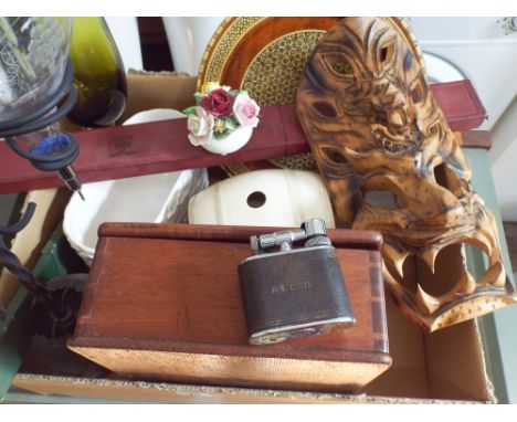 A box containing glass, china, oil lamp, masks, measuring implements etc