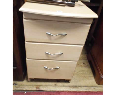 A light beech 3 drawer chest