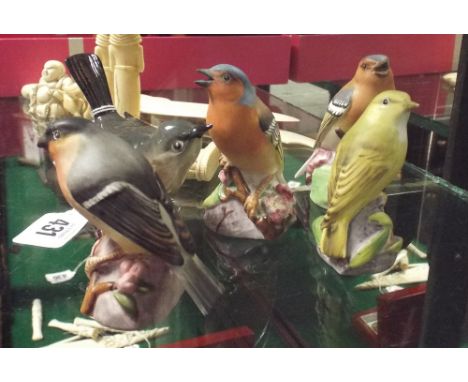 Four Royal Worcester British bird studies and a Beswick White Throat 