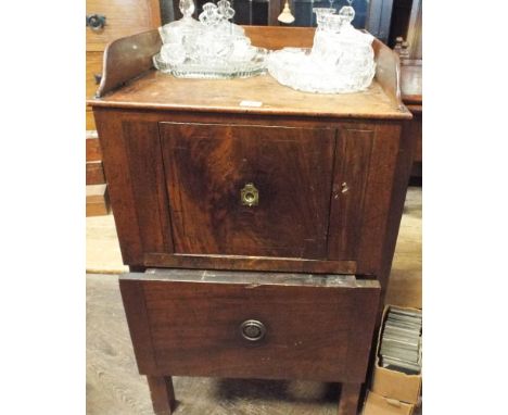 A Georgian mahogany commode made into a cupboard with drawer with tray top