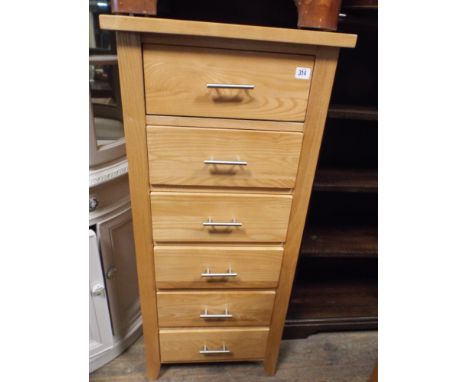 An 18" modern light beech effect tall boy chest of 6 drawers
