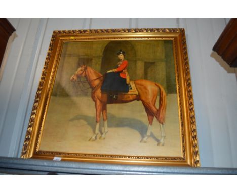 A large coloured portrait print Queen Elizabeth II on horseback in gilt frame