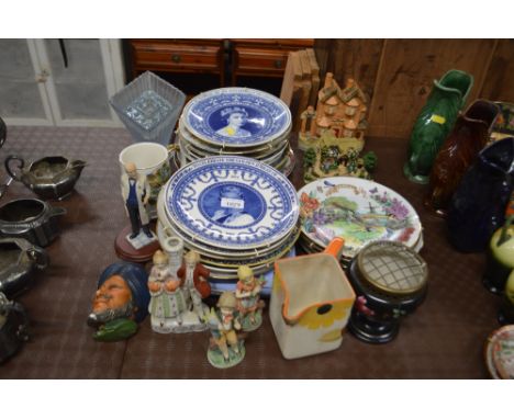 A quantity of various collector's plates, model cottages, Staffordshire style ornaments, a rose bowl etc. 