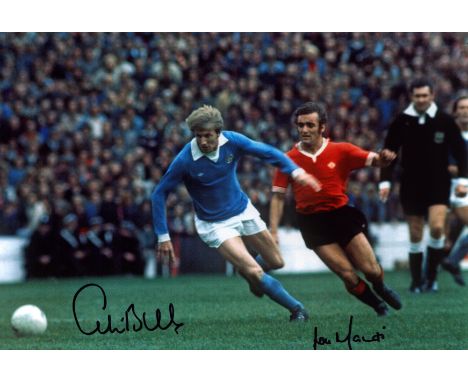 Football Colin Bell and Lou Macari signed 12x8 inch colour photo picture playing in the Manchester Derby. Good condition. All