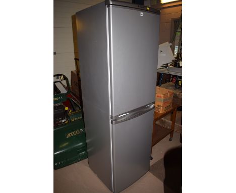 A Hotpoint first edition fridge freezer in silver finish.