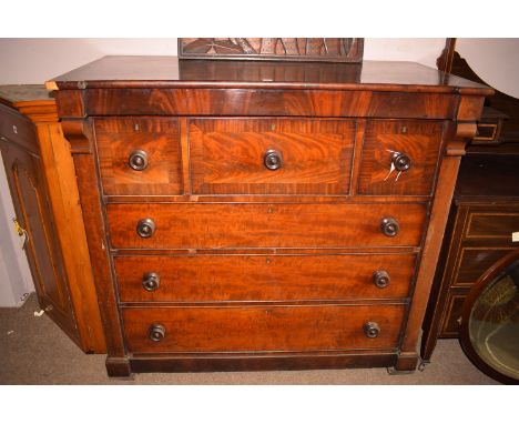 A Victorian mahogany scotch chest of six drawers fitted turned handles.