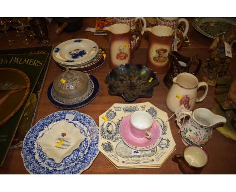 A collection of Victorian, mainly commemorative ceramics, including: a Macintyre jug titled 'A Gentleman in Khaki' with a poe