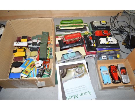 A collection of miscellaneous boxed and unboxed die-cast and other model vehicles, mostly cars, commercials and vintage vehic