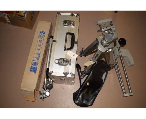 A camera tripod by Velbon, model no. AEF-3, with leatherette carrying case; together with another tripod camera stand; and a 
