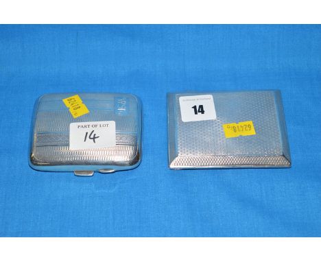 Two silver cigarette cases with engine turned decoration.